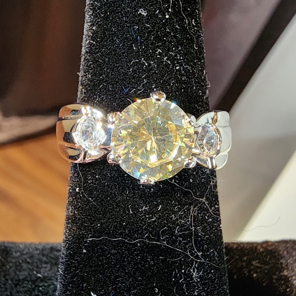 Silver Tone Ring With Large Light Yellow Gemstone